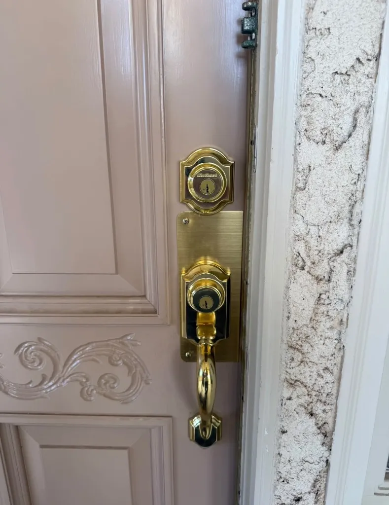 New polished brass Kwikset entry handle and deadbolt